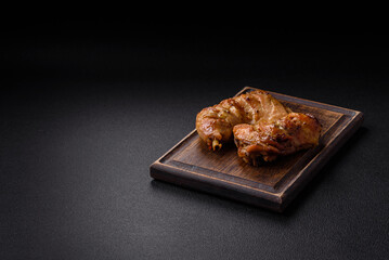 Delicious grilled chicken leg or quarter with salt and spices