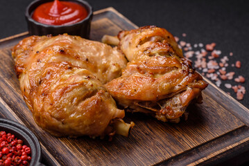 Delicious grilled chicken leg or quarter with salt and spices