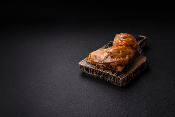 Delicious grilled chicken leg or quarter with salt and spices