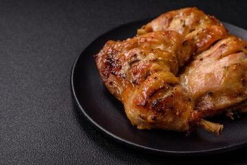 Delicious grilled chicken leg or quarter with salt and spices