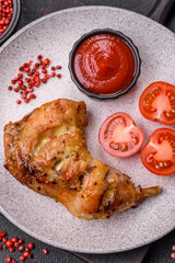 Delicious grilled chicken leg or quarter with salt and spices