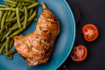 Delicious grilled chicken leg or quarter with salt and spices