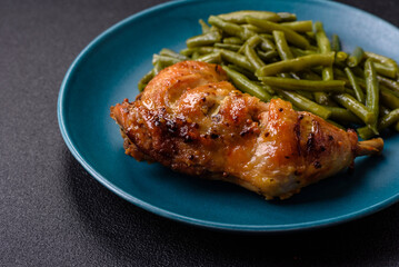 Delicious grilled chicken leg or quarter with salt and spices