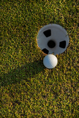 Obraz premium Closeup Golf ball on green grass on course, Sport and lifestyle