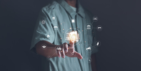 Man touching online shopping cart icon on application. Concept of internet ecommerce technology,...