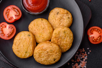 Round fish or chicken nuggets with salt and spices