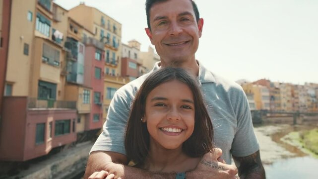 Close-up potrait of a happy father and daughter