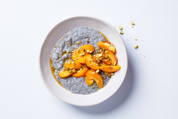 Chia pudding with caramelized apricot, maple syrup and pistachio.