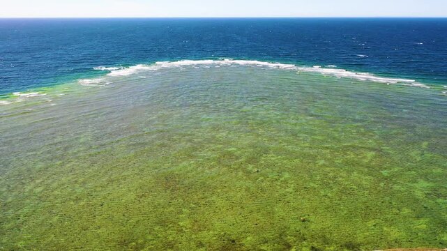 4K panoramic aerial video from flying drone to Panga coastal cliff and lighthouse , northern shore of Saaremaa island, near Kuressaare, Baltic Klint.Saaremaa , Estonia