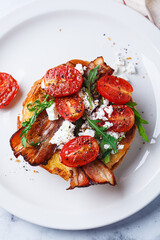 French toast with bacon, tomato, arugula and feta.