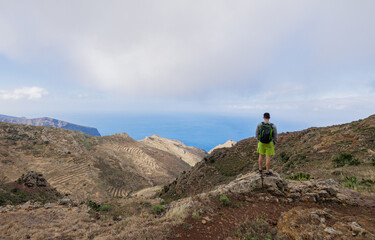 Boy hiking in the Teno Rural Park on the island of Tenerife.