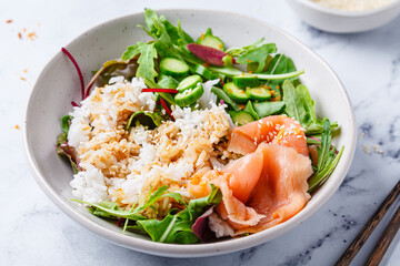 Poke salad - salmon with rice and cucumber.