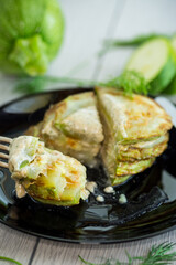 zucchini fried in batter with sauce