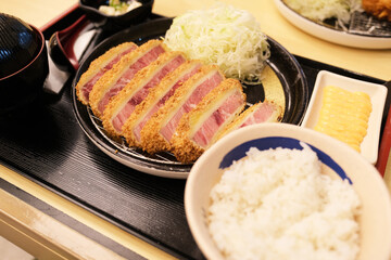 Beef cutlets served with white rice
