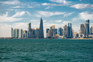 Obraz premium The Panoramic skyline of Doha, Qatar during sunset