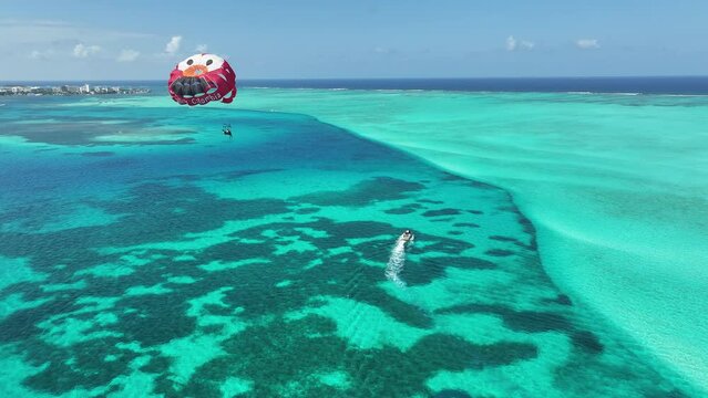 Parasailing At San Andres Caribbean Island Colombia. Parasail San Andres Caribbean Island. Coast Horizon Seaside Summertime. Coast Outside Seaside Beach Travel. Coast Summertime Backgrounds Landmark.