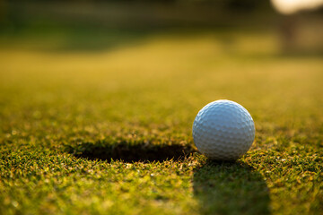 Golf course with ball and grass