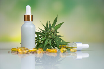 Hemp oil bottle with hemp leaf and cannabis leaf, marijuana