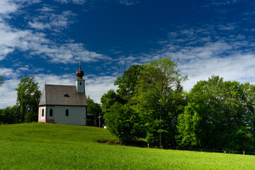 Fototapeta premium Church on a hill in Bavaria in summer