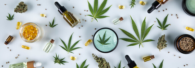 Bottles with hemp oil and cannabis leaves, marijuana  on white background