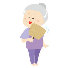 団扇であおいで涼むシニア女性1