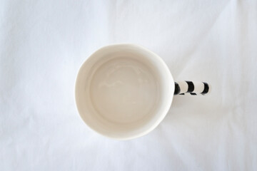 Creative ceramic cup is on the table