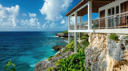 Fototapeta premium Cliffside dwelling with robust Bahama shutters, offering durability against harsh weather conditions