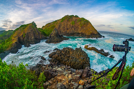 dramatic coastal scene  with rocky cliffs and waves