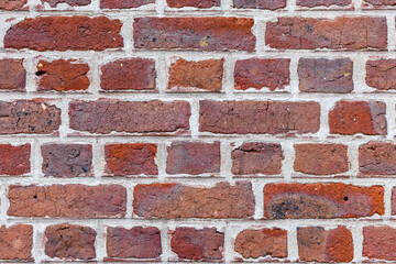 A brick wall with a white border