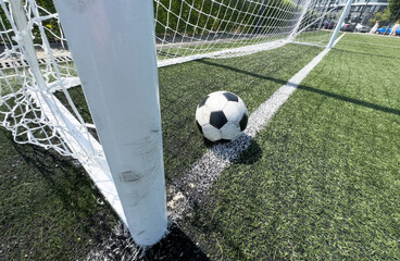 Soccer ball on the field of stadium