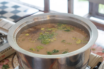 Thai styled bowl of congee served for breakfast