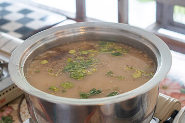 Thai styled bowl of congee served for breakfast