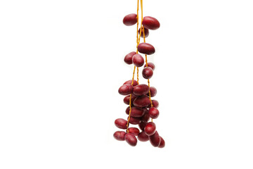 Fresh Red Date Palm Fruit isolated on white background