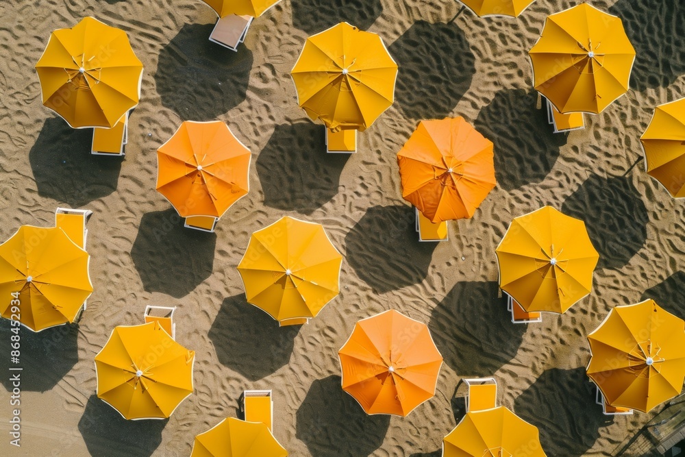 Aufkleber symmetrical aerial view of orange beach umbrellas on sandy beach with intricate geometric patterns i