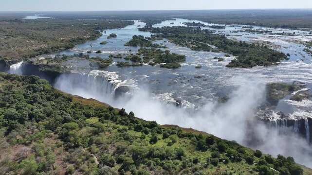 Victoria Falls At Livingstone Northern Rhodesia Zambia. Natural Beauty Livingstone Northern Rhodesia. Landscape Dramatic Sky Waterfall Waterfalls. Landscape Landscaping Waterfall Mountain Panorama.
