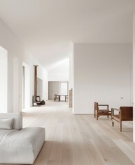 Minimalist interior with white wall, light wood flooring, and minimalist furniture 