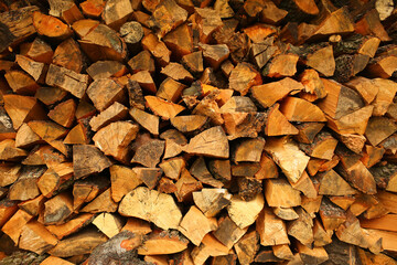 Pile of wood logs horizontal background