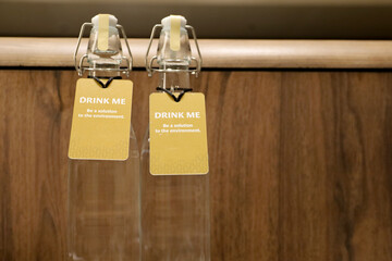 The label says I drink bottled water. environmental care program by minimizing the use of plastic bottles.