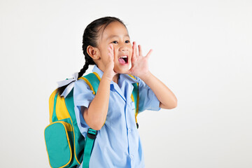 Portrait smile Asian little girl kindergarten hold hands open mouth make shout speak loud announcement studio isolated white background, happy woman kid wear school uniform screaming, back to school