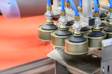 The high technology material handling process in canned food production by robotic system.