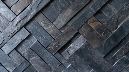 Screen wall with layers of thin slate slabs arranged in a herringbone pattern, offering a stylish and sturdy privacy option
