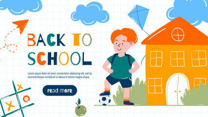 Back to school.A boy stands near the school building with a soccer ball.