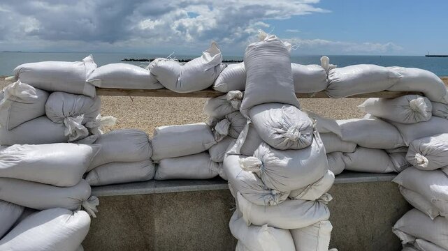 Military sandbag fortification with embrasure on Tereshkova Embankment of the resort town Yevpatoria, Crimea, Russia 2024