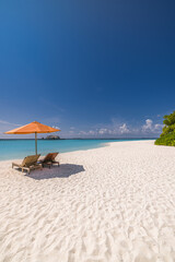 Beautiful panoramic sea sand sky. Tropical relax beach sunny summer island landscape. Love couple chairs umbrella palm leaves romantic coast. Luxury travel destination. Honeymoon vacation best tourism