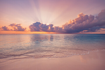 Peaceful closeup sea sand beach. Beautiful nature landscape. Inspire tropical beach seascape wave horizon. Fantasy orange golden sunset rays sky calm tranquil relaxing summer. Vacation travel tourism