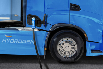 A hydrogen fuel cell semi truck with H2 refueling nozzle. Eco-friendly commercial vehicle concept.