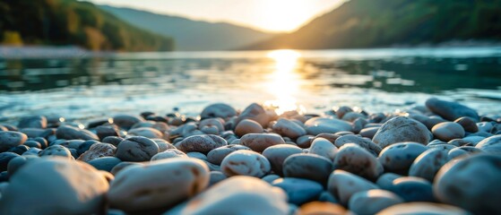 Obraz premium Close up image of small rounded pebbles on the river bank for background