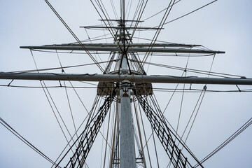 Obraz premium Photograph of the rigging of a vintage sailboat without the sails
