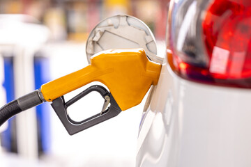 Refill and filling Oil Gas Fuel at station. Gas station - refueling. To fill the machine with fuel....
