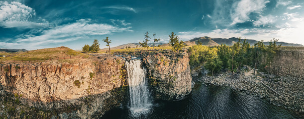 Fototapeta premium The Orkhon Waterfall, also called Ulaan Tsutgalan, is one of the most famous sights in central Mongolia, but the valley downstream is even more beautiful